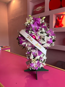 Mini cruz con orquídeas